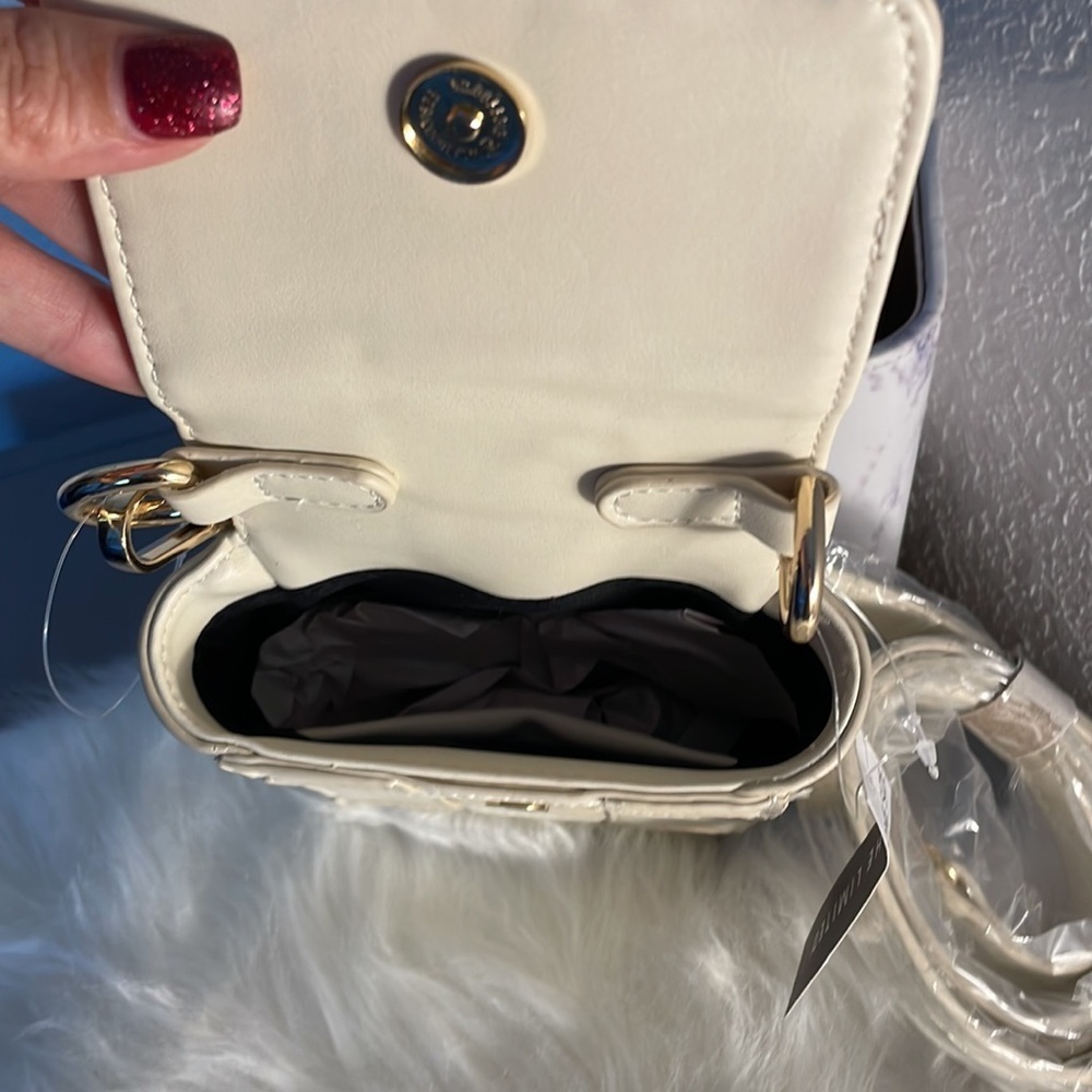 ๐ The Limited crossbody cream purse you can also take straps off NWT - Picture 4 of 4
